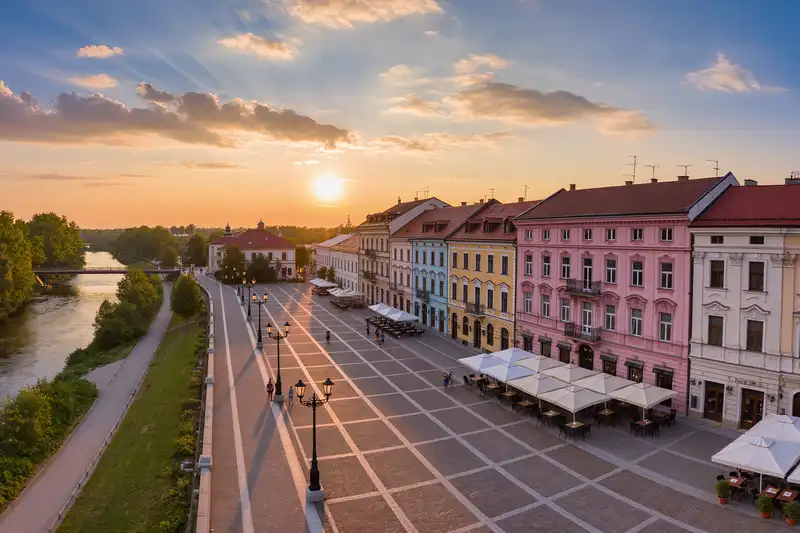 Gyor Baroque square and riverside path at sunset