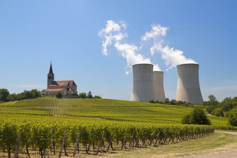 Visonta landscape with power station, church and vineyards in northern Hungary.